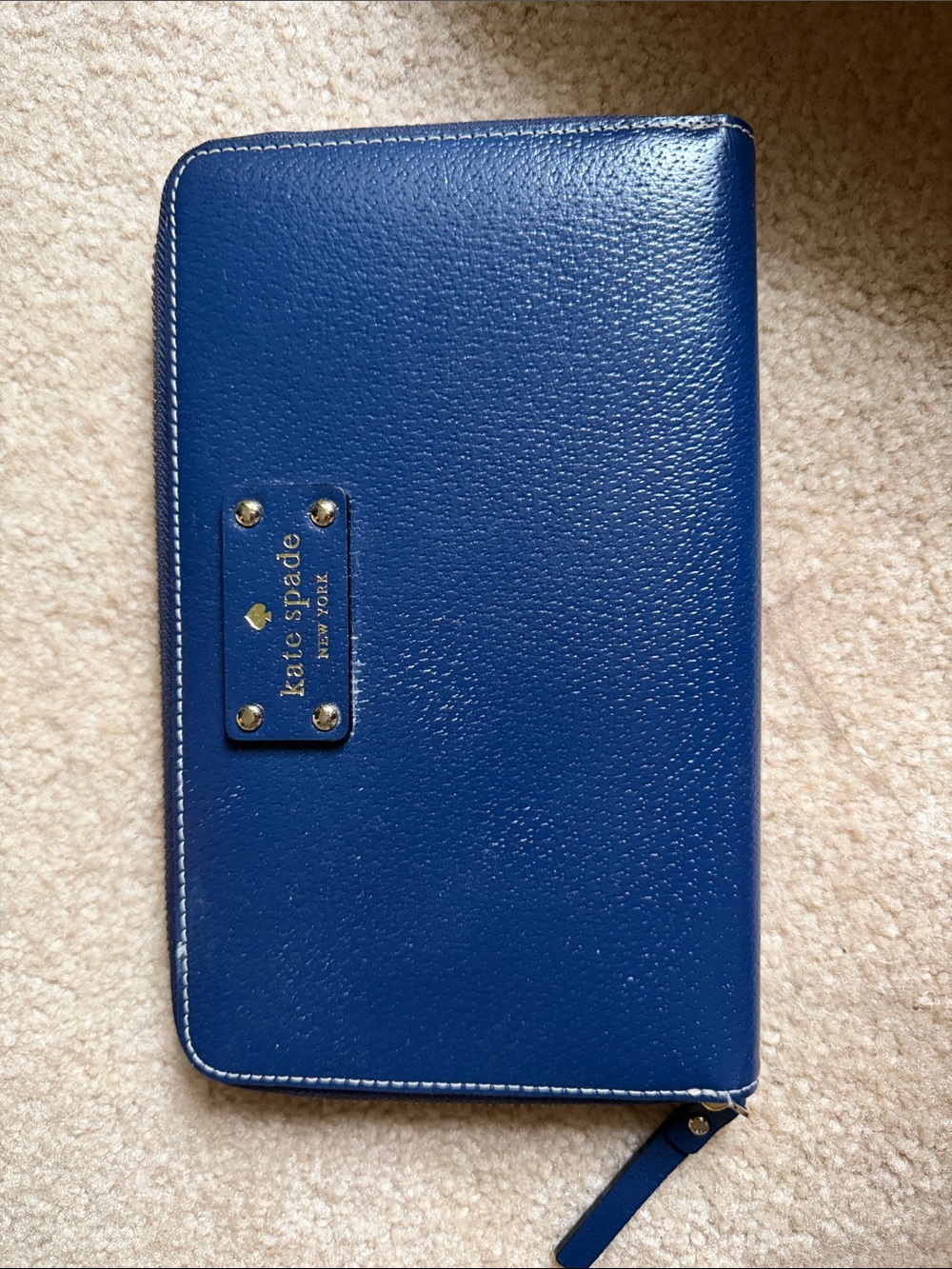 kate spade navy blue pebble leather tablet sleeve with logo plaque